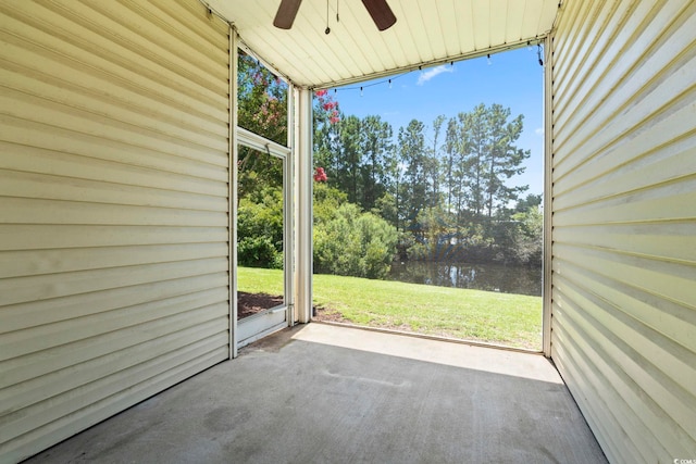 105 Ashley Park Dr Unit 2B, Myrtle Beach, SC 29579 - view of patio with a ceiling fan, a water view, and view of wooded area
