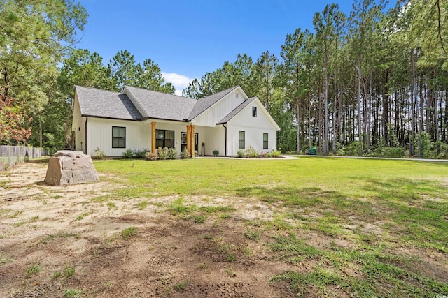 7405 Louisville Rd, Aynor, SC 29511 - modern inspired farmhouse with a front yard and a shingled roof