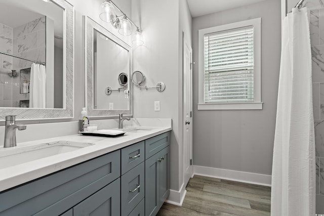 7405 Louisville Rd, Aynor, SC 29511 - full bathroom with wood finished floors, double vanity, and a shower with curtain