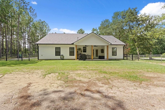 7405 Louisville Rd, Aynor, SC 29511 - rear view of property with a ceiling fan, a fenced backyard, a patio, and roof with shingles
