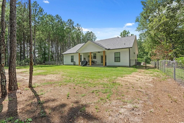 7405 Louisville Rd, Aynor, SC 29511 - view of front of property with a ceiling fan, a fenced backyard, and a patio area