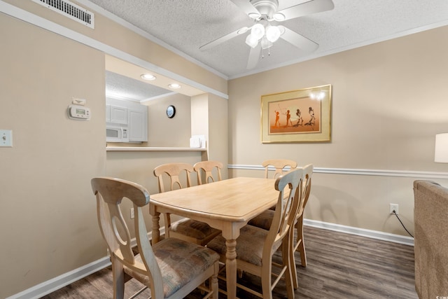 415 Ocean Creek Dr Unit 2243, Myrtle Beach, SC 29572 - dining room featuring wood finished floors, a ceiling fan, a textured ceiling, ornamental molding, and recessed lighting