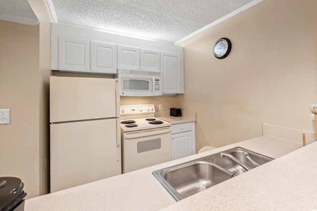 415 Ocean Creek Dr Unit 2243, Myrtle Beach, SC 29572 - kitchen with white appliances, a textured ceiling, light countertops, ornamental molding, and white cabinets