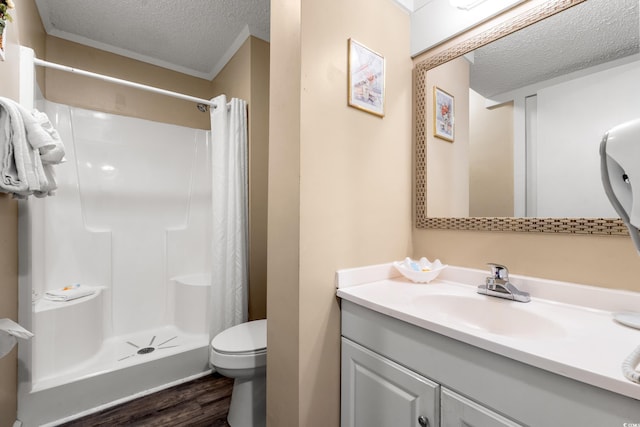 415 Ocean Creek Dr Unit 2243, Myrtle Beach, SC 29572 - bathroom with a textured ceiling, wood finished floors, vanity, and a shower with curtain
