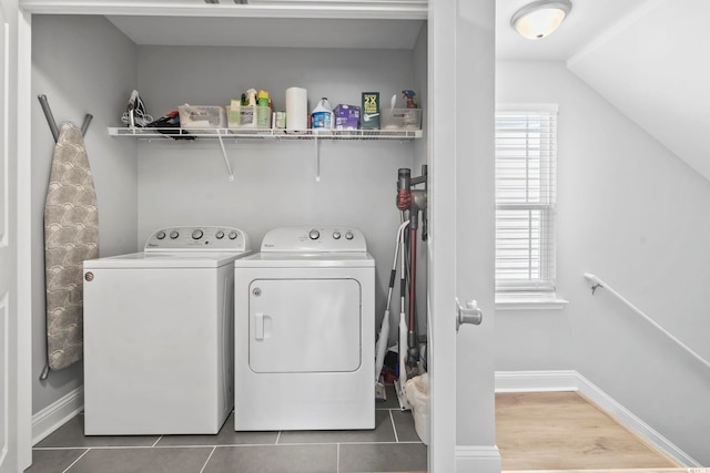 1514-B S Ocean Blvd, Surfside Beach, SC 29575 - laundry room with washer and clothes dryer, plenty of natural light, and tile patterned flooring