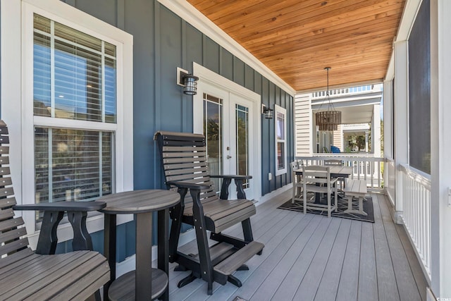 1514-B S Ocean Blvd, Surfside Beach, SC 29575 - wooden porch with outdoor dining area