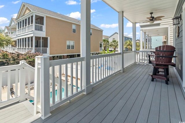 1514-B S Ocean Blvd, Surfside Beach, SC 29575 - wooden deck featuring a ceiling fan