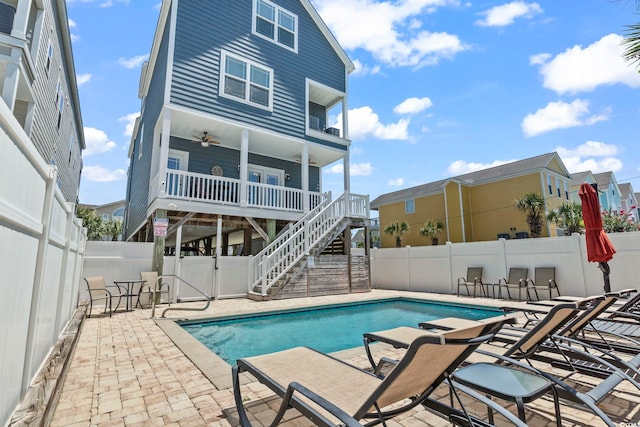 1514-B S Ocean Blvd, Surfside Beach, SC 29575 - view of pool with stairway, a fenced backyard, a patio area, and a ceiling fan