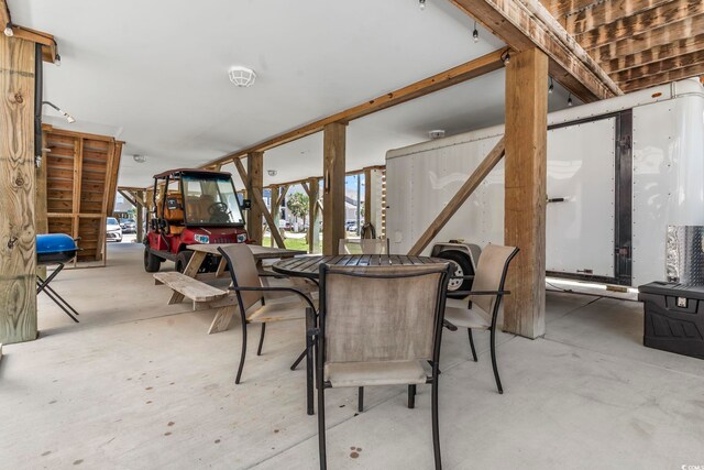 1514-B S Ocean Blvd, Surfside Beach, SC 29575 - dining area with unfinished concrete floors