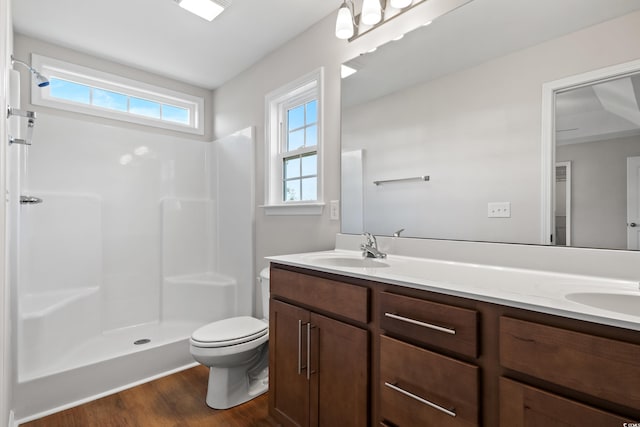 133 Cooper Ln, Georgetown, SC 29440 - bathroom with double vanity, wood finished floors, and a shower