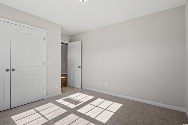 133 Cooper Ln, Georgetown, SC 29440 - unfurnished bedroom featuring light carpet and a closet