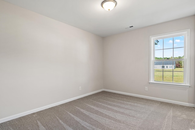 133 Cooper Ln, Georgetown, SC 29440 - spare room featuring carpet flooring and baseboards
