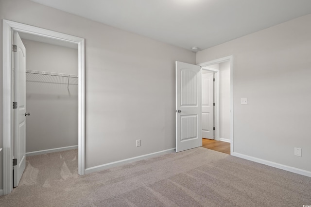133 Cooper Ln, Georgetown, SC 29440 - unfurnished bedroom featuring carpet flooring and a spacious closet