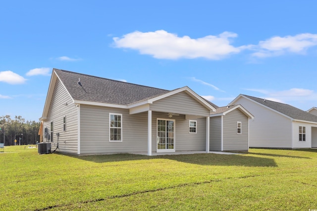 133 Cooper Ln, Georgetown, SC 29440 - back of house featuring ceiling fan, roof with shingles, and a yard
