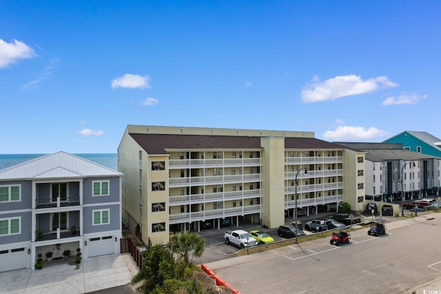 3217 S Ocean Blvd Unit 305, North Myrtle Beach, SC 29582 - view of apartment building / complex with a garage