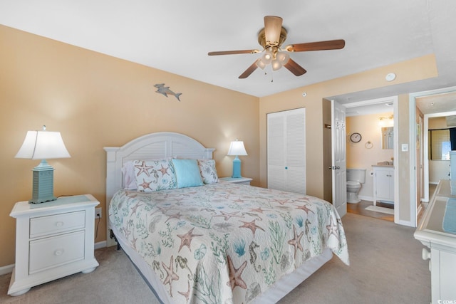 3217 S Ocean Blvd Unit 305, North Myrtle Beach, SC 29582 - bedroom featuring light carpet, a closet, a ceiling fan, and ensuite bathroom