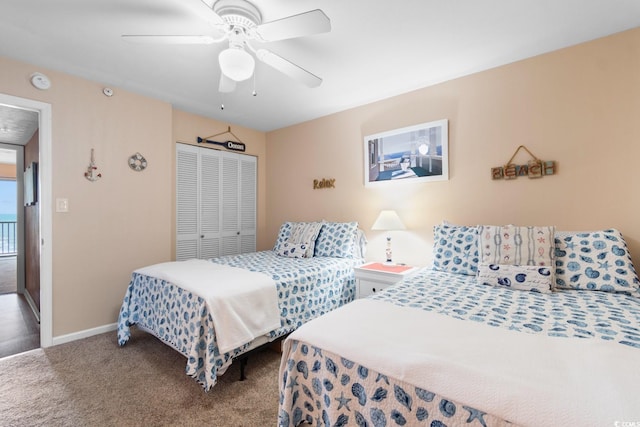 3217 S Ocean Blvd Unit 305, North Myrtle Beach, SC 29582 - bedroom featuring carpet, a closet, and ceiling fan