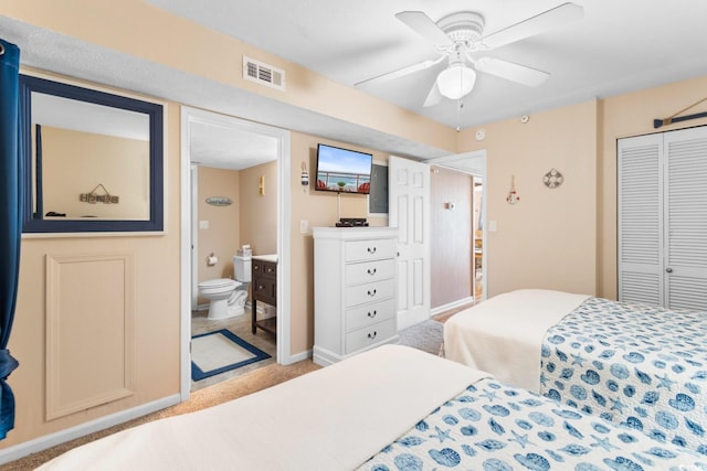 3217 S Ocean Blvd Unit 305, North Myrtle Beach, SC 29582 - bedroom with carpet, ensuite bathroom, a closet, and a ceiling fan