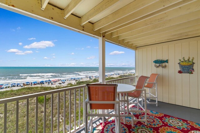 3217 S Ocean Blvd Unit 305, North Myrtle Beach, SC 29582 - balcony featuring view of water and beach