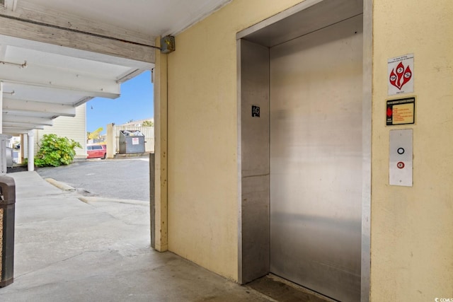 3217 S Ocean Blvd Unit 305, North Myrtle Beach, SC 29582 - view of exterior entry featuring elevator