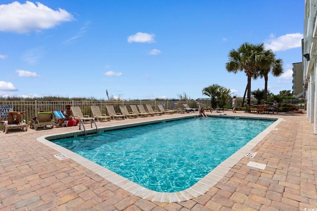 3217 S Ocean Blvd Unit 305, North Myrtle Beach, SC 29582 - community pool with a patio