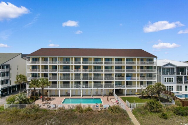 3217 S Ocean Blvd Unit 305, North Myrtle Beach, SC 29582 - view of apartment building / complex with a community pool