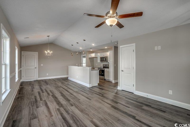 5087 Marigold Rd, Conway, SC 29527 - unfurnished living room featuring lofted ceiling, a chandelier, ceiling fan, dark wood-type flooring, and recessed lighting