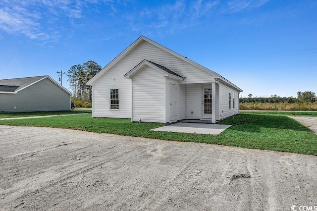 5087 Marigold Rd, Conway, SC 29527 - rear view of property featuring a patio and a lawn