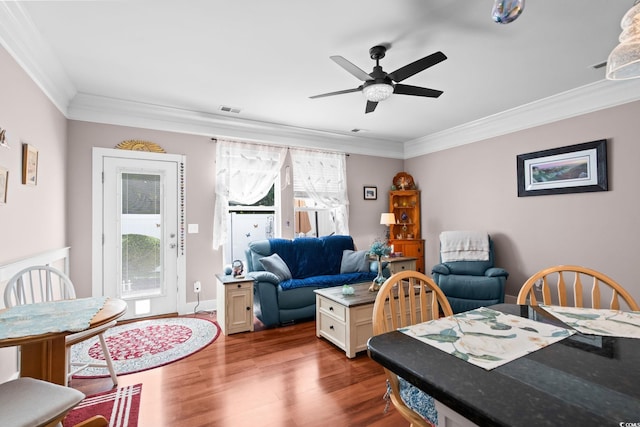 190 Olde Towne Way Unit 3, Myrtle Beach, SC 29588 - living area featuring ornamental molding, healthy amount of natural light, dark wood-style flooring, and ceiling fan