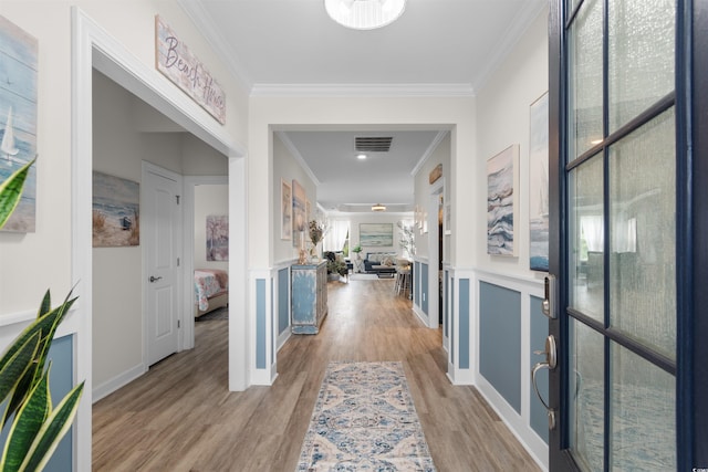 3382 Eversheen Dr, Little River, SC 29566 - entryway featuring crown molding and light wood finished floors