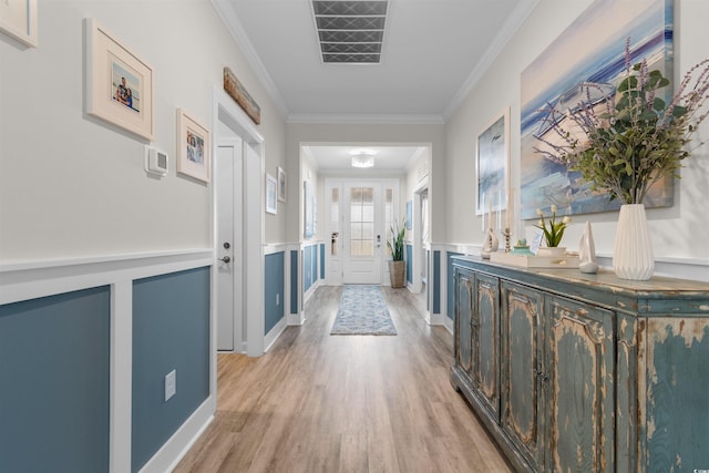 3382 Eversheen Dr, Little River, SC 29566 - hall featuring light wood-style floors, ornamental molding, and wainscoting