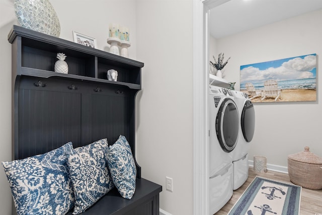 3382 Eversheen Dr, Little River, SC 29566 - laundry room featuring washer and clothes dryer and light wood-type flooring