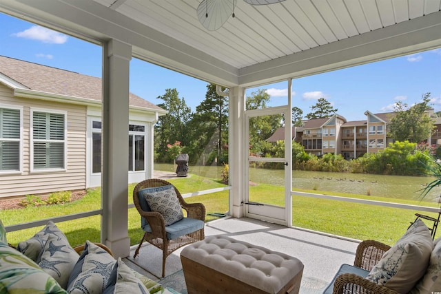3382 Eversheen Dr, Little River, SC 29566 - sunroom / solarium featuring a water view, a ceiling fan, and an outdoor living space