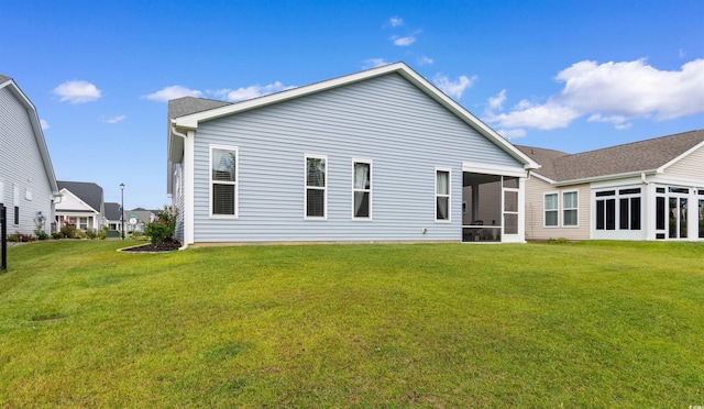 3382 Eversheen Dr, Little River, SC 29566 - back of property featuring a sunroom and a yard