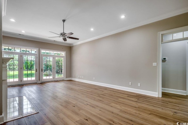 3535 Golf Ave, Little River, SC 29566 - spare room featuring a ceiling fan, ornamental molding, wood finished floors, and recessed lighting