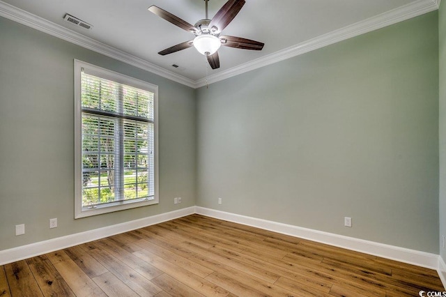 3535 Golf Ave, Little River, SC 29566 - unfurnished room with crown molding, a ceiling fan, and hardwood / wood-style floors