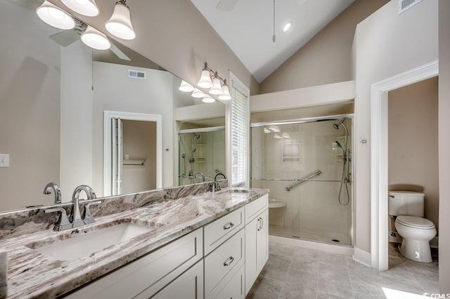 3535 Golf Ave, Little River, SC 29566 - bathroom featuring ceiling fan, a stall shower, double vanity, vaulted ceiling, and tile patterned floors