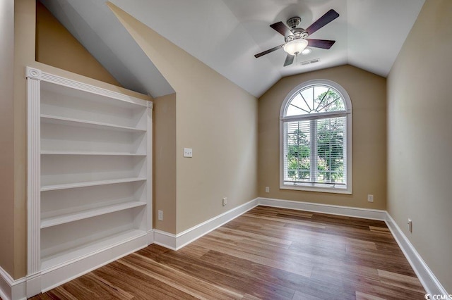 3535 Golf Ave, Little River, SC 29566 - spare room with wood finished floors, a ceiling fan, and vaulted ceiling