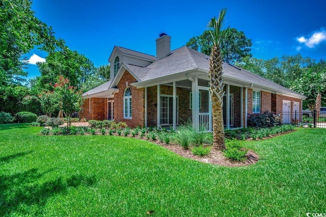 3535 Golf Ave, Little River, SC 29566 - view of side of property with brick siding, a chimney, and roof with shingles