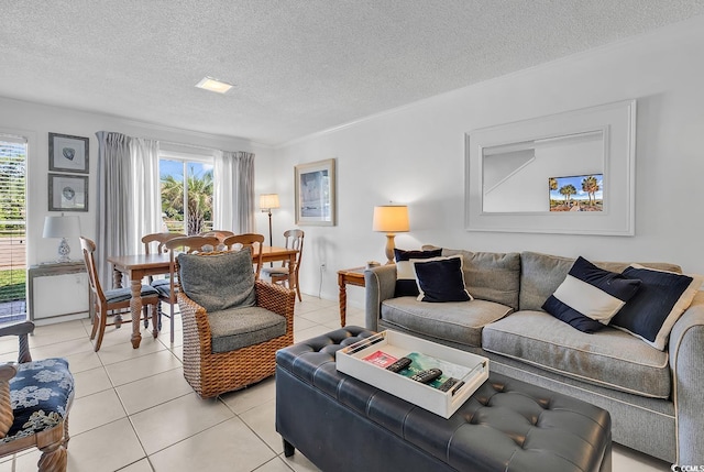 10200 Lake Shore Dr Unit 26, Myrtle Beach, SC 29572 - living room featuring plenty of natural light, light tile patterned floors, and a textured ceiling