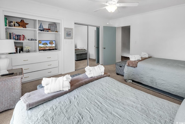 10200 Lake Shore Dr Unit 26, Myrtle Beach, SC 29572 - bedroom with carpet floors, crown molding, a closet, and ceiling fan