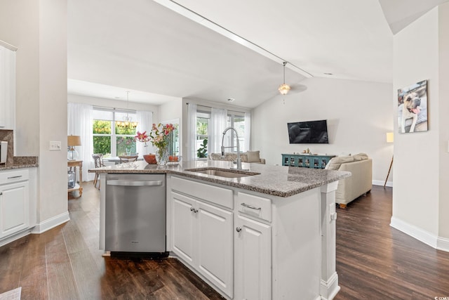 756 Culbertson Ave, Myrtle Beach, SC 29577 - kitchen featuring stainless steel dishwasher, vaulted ceiling, dark wood-style floors, light stone countertops, and white cabinetry