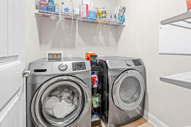756 Culbertson Ave, Myrtle Beach, SC 29577 - laundry area featuring washing machine and clothes dryer and baseboards