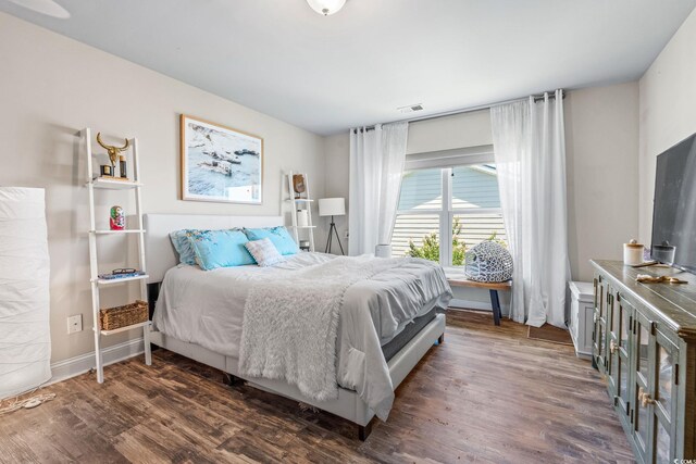 756 Culbertson Ave, Myrtle Beach, SC 29577 - bedroom featuring dark wood-style flooring and baseboards