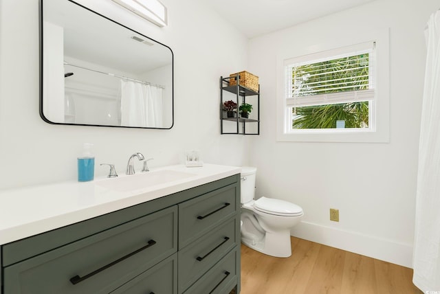 5700 Nixon St, North Myrtle Beach, SC 29582 - bathroom with wood finished floors and vanity