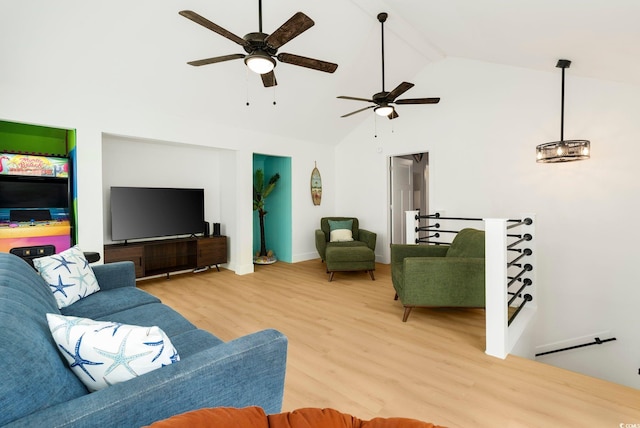 5700 Nixon St, North Myrtle Beach, SC 29582 - living room featuring high vaulted ceiling, wood finished floors, beam ceiling, and ceiling fan