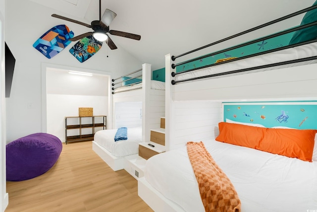 5700 Nixon St, North Myrtle Beach, SC 29582 - bedroom with wood finished floors, a ceiling fan, and vaulted ceiling