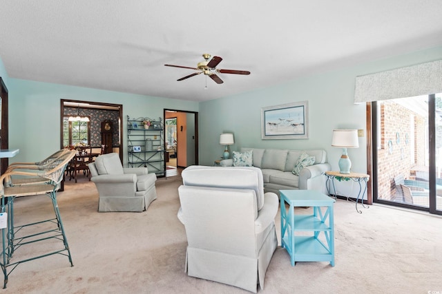 218 Lander Dr, Conway, SC 29526 - living area with carpet floors, ceiling fan, and a chandelier
