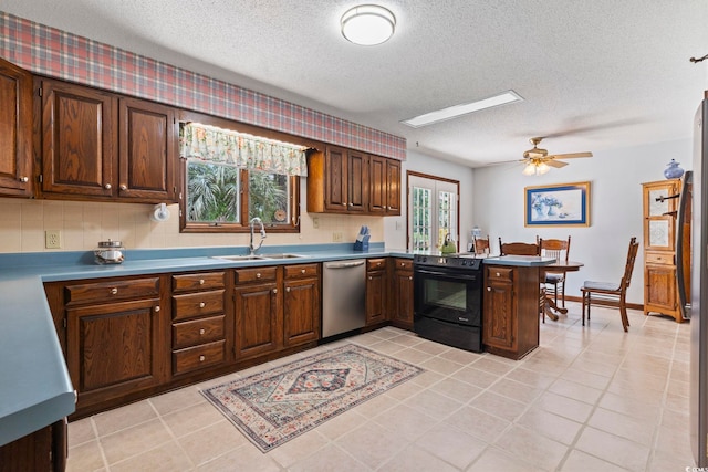 218 Lander Dr, Conway, SC 29526 - kitchen featuring appliances with stainless steel finishes, a textured ceiling, a peninsula, ceiling fan, and light tile patterned flooring