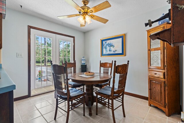 218 Lander Dr, Conway, SC 29526 - dining area with french doors, a ceiling fan, light tile patterned flooring, and a textured ceiling